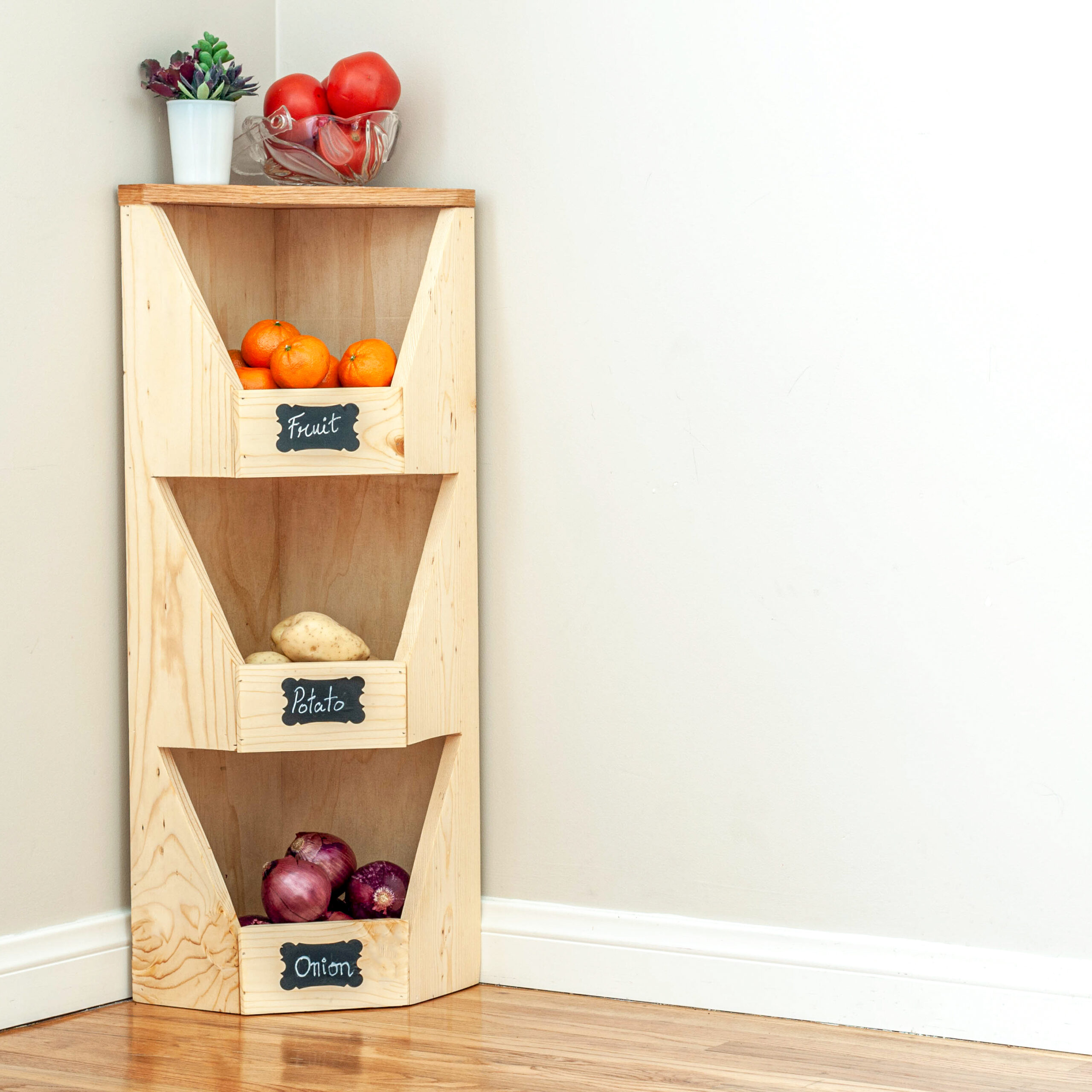 DIY Corner Vegetable Storage Bin - Anika's DIY Life  Vegetable storage bin,  Vegetable storage, Easy woodworking projects