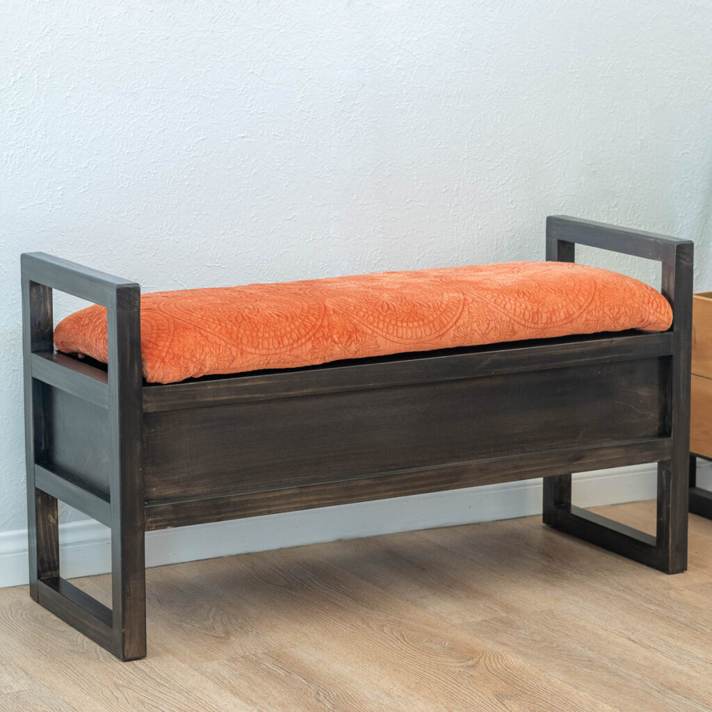 DIY upholstered bench with orange fabric